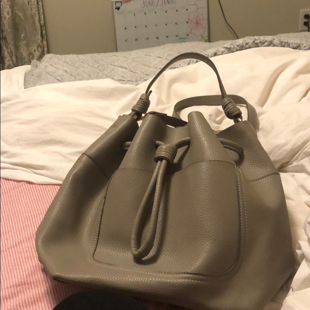 Grey bucket bag with gold hardware